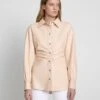 7 For All Mankind Faux Leather Cinched Waist Button Up Shirt In Nude -7 For All Mankind 1261888a53e1ee12ba2fb83f6ae9952b
